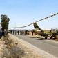 Libyan warplane landed on a road in neighbouring Tunisia