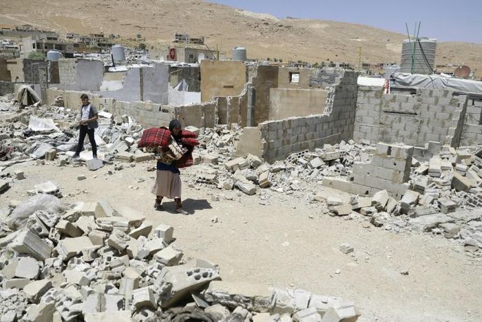 Syrian refugees have been ordered by the Lebanese government to demolish cinderblock shelters