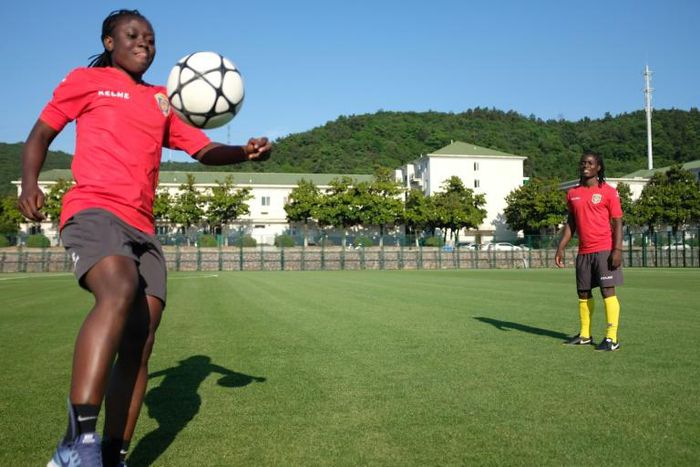 Ball control: Jiangsu Suning midfielder and Ghana captain Elizabeth Addo (left) trains with Malawi skipper Tabitha Chawinga in Nanjing