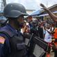Anti-government protesters confronted police on Wednesday ahead of the demonstration