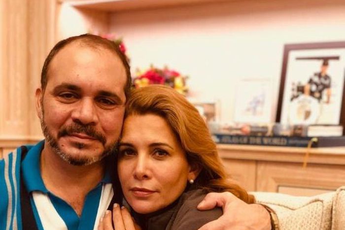 This handout picture released on the Twitter page of Jordan's Prince Ali Al Hussein on July 31, 2019 shows him, the half brother of King Abdullah and the president of the Jordanian Football Association, hugging his sister Princess Haya (R) at an undisc...