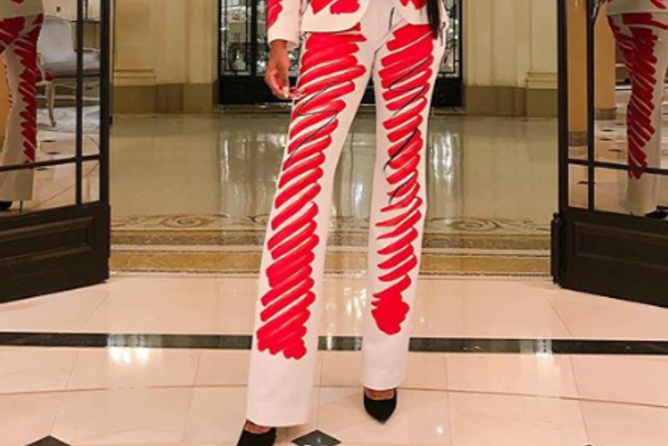 Style influencer Didi Olomide looks sensational in a crayon- inspired Moschino suit [Credit: Instagram/ Olomidedidi]