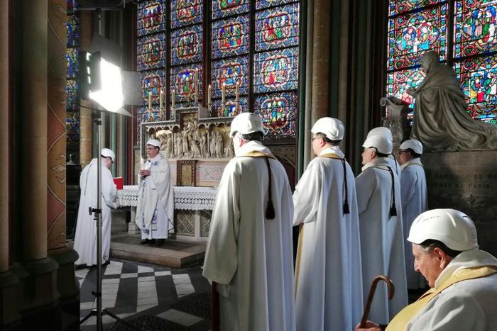 The Archbishop of Paris Michel Aupetit conducted the first mass in a side chapel two months to the day after a devastating fire engulfed Notre-Dame cathedral