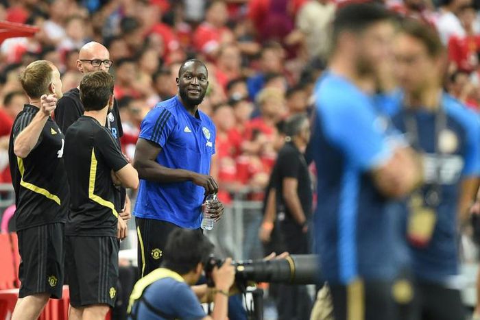Manchester United's Romelu Lukaku (C) is seen with his team before the International Champions Cup football match between Manchester United and Inter Milan in Singapore on July 20, 2019