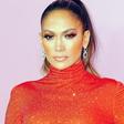 J.Lo Shows Off Toned Abs And Back In New Photos