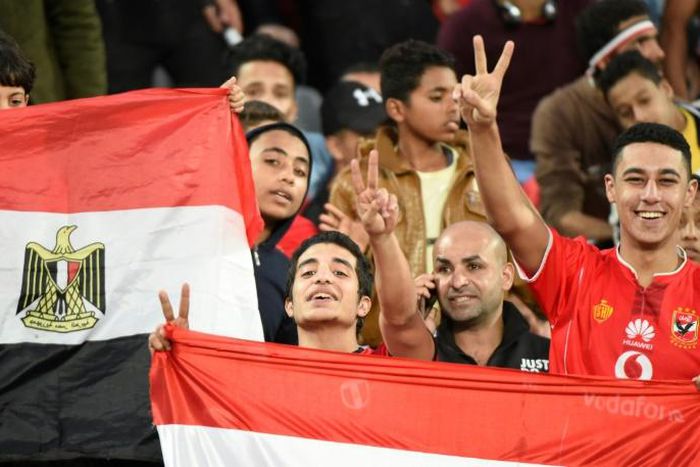Egyptian fans cheer for their team ahead on an Africa Cup of Nations qualifier football match against Tunisia at the Borg El Arab Stadium near Alexandria on November 16, 2018
