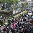 Supporters of ex-general Prabowo Subianto gathered to listen to the verdict broadcast on speakers near the constitutional court