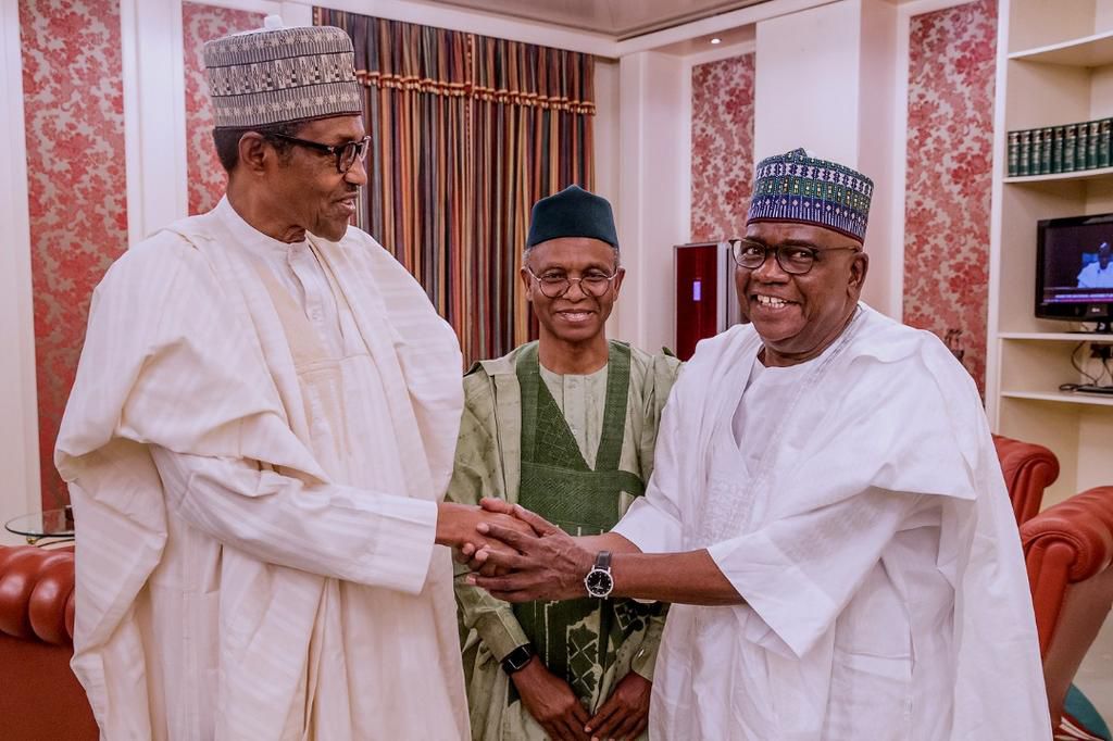 President Muhammadu Buhari shakes hands with Senator Danjuma Goje [Premium Times]