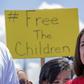 Democratic Representative Alexandria Ocasio-Cortez attends a press conference following a tour of migrant detention centers in Texas