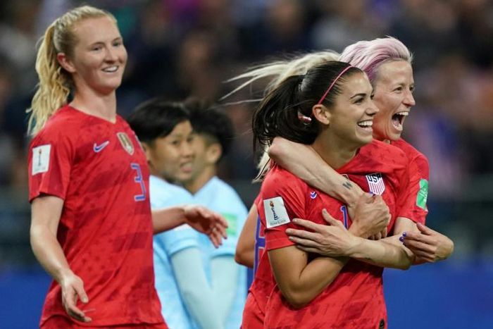 Alex Morgan (2R) celebrates with her teammates after scoring one of her five goals in the USA's record-breaking 13-0 hammering of Thailand