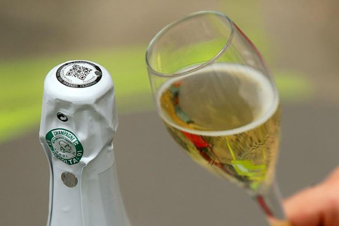 The QR code on the foil of the bottle helps champagne makers battle counterfeiters and provides a link to customers
