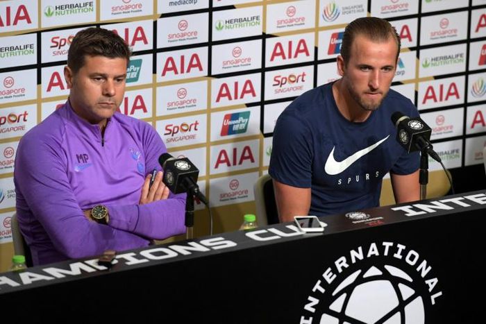 Mauricio Pochettino (L) said in Singapore that his team 'deserved to win' last month's Champions League final