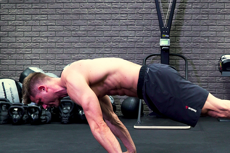 The Planche Rock to Pushup Carves Superhuman Abs