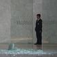 A security guard looks at shattered glass at a shopping mall in Mexico City on July 25, 2019 where two Israelis suspected of mafia links were shot dead in a restaurant.