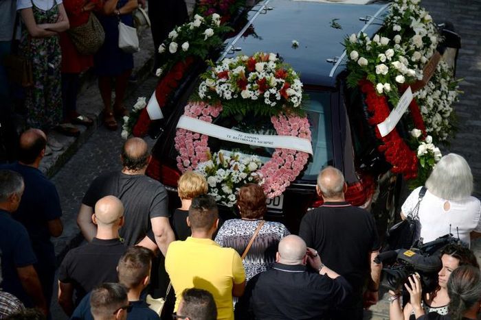 Relatives and friends march behind the funeral cortege of former Spanish football player Jose Antonio Reyes