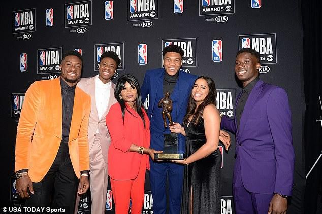Giannis Antetokounmpo with his brothers, mum and girlfriend (USA Today Sports)