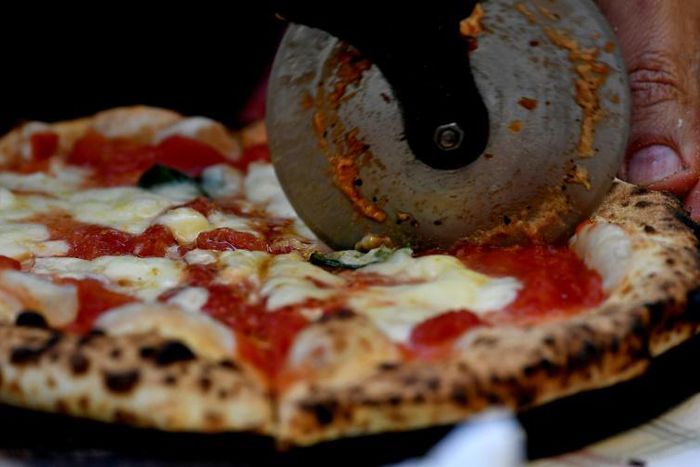 A new South African pizza made with cannabis oil won't maker diners high, says the restaurant chain's supplier, but it might confer calming effects when eaten