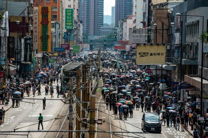 Protesters spilled into the streets of Yuen Long on Sunday afternoon