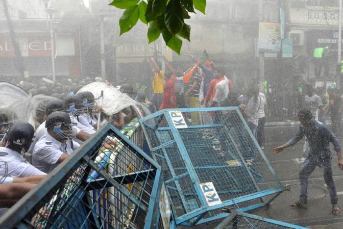 Bharatiya Janata Party activists clash with police during a rally in Kolkata on June 12, 2019