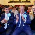 Nigel Farage (centre) hopes his Brexit Party can build on its success in the European Parliament elections to win a seat in the British parliament on Thursday in Peterborough