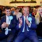 Nigel Farage (centre) hopes his Brexit Party can build on its success in the European Parliament elections to win a seat in the British parliament on Thursday in Peterborough