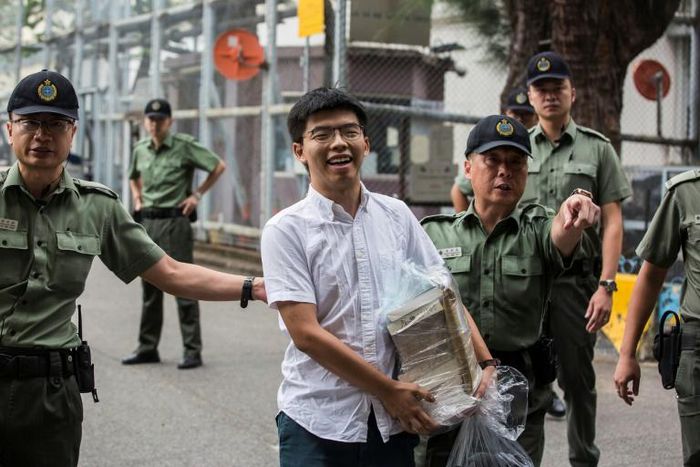 Hong Kong democracy activist Joshua Wong smiled as he walked free from prison