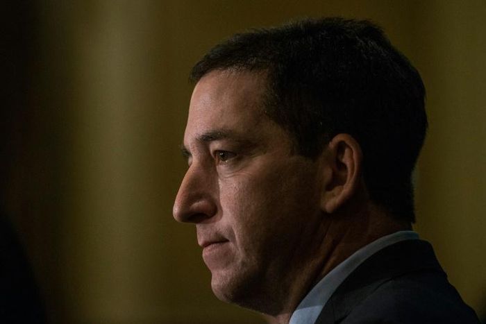 Journalist Glenn Greenwald says that despite the threats, he and his family do not plan to leave Brazil