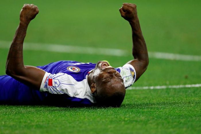 Haiti's midfielder Wilde-Donald Guerrier celebrates after scoring the winning goal during the Gold Cup quarterfinal between Haiti and Canada