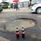 ‘Generous’ lawyer throws party for potholes in front of Zenith Bank for getting "bigger and deeper"