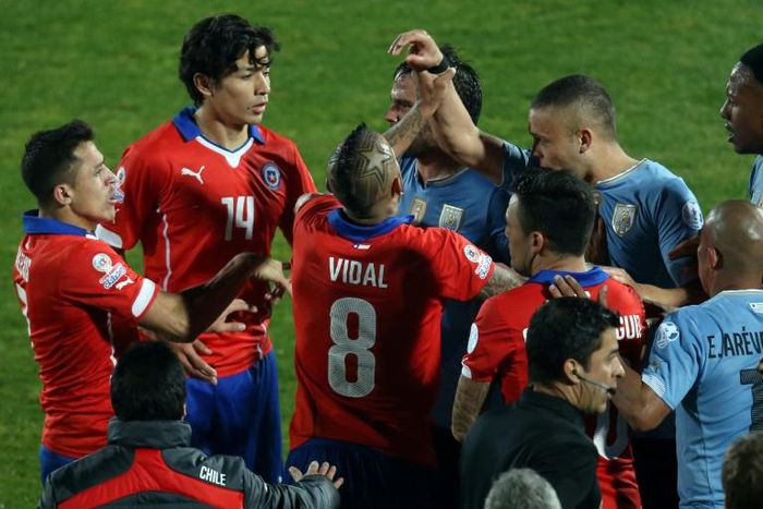 Chile and Uruguay players argue during their 2015 Copa America clash in Santiago