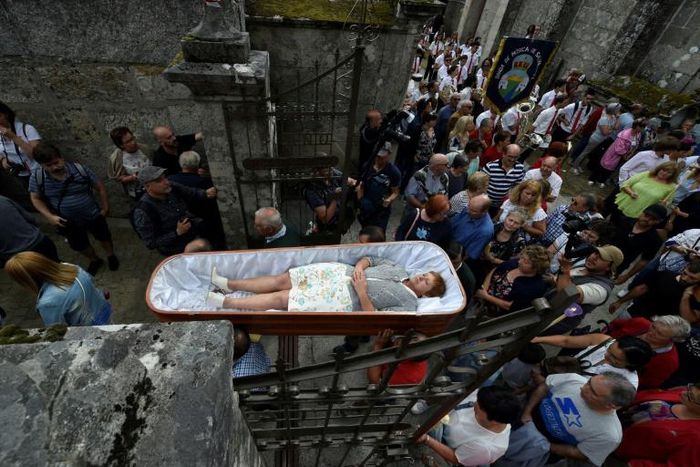 The strange ritual takes place on July 29 each year in the village of Las Nieves in Galicia in northwestern Spain