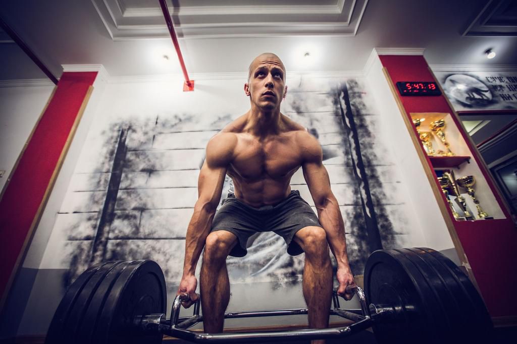 Man exercise with weights