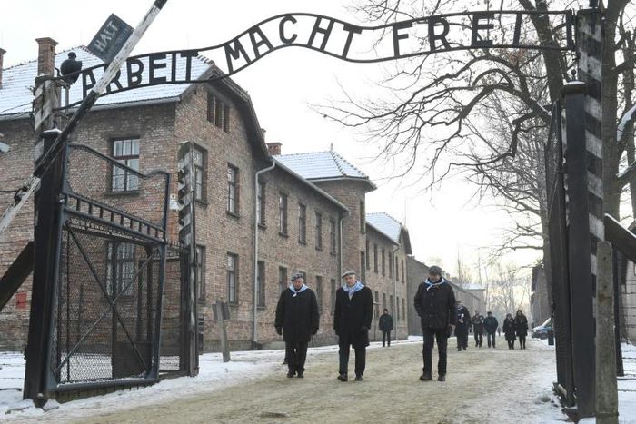 The main gate to the Nazi death camp Auschwitz-Birkenau in southern Poland with its infamous slogan "Work sets you free."