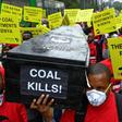 Protesters march in downtown Nairobi to demonstrate against a coal-fired power station planned for Kenya's heritage-listed Lamu archipelago