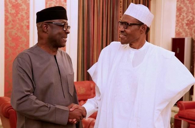 Former Ekiti State governor, Niyi Adebayo (left), shakes hands with President Muhammadu Buhari (right) [PM Parrot]