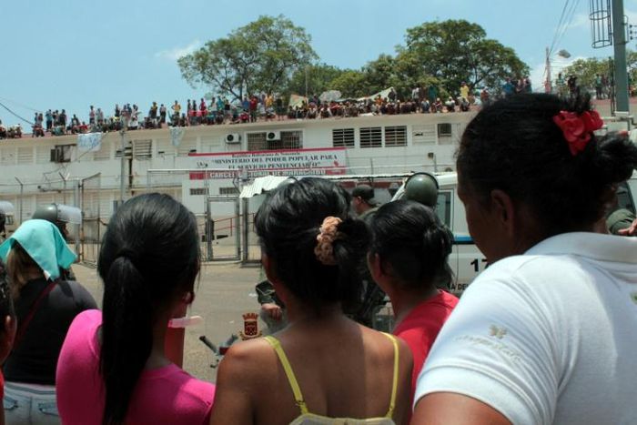 Inmates pictured at a 2013 protest at Venezuela's Sabaneta jail, where 121 inmates were killed in a riot in 1994