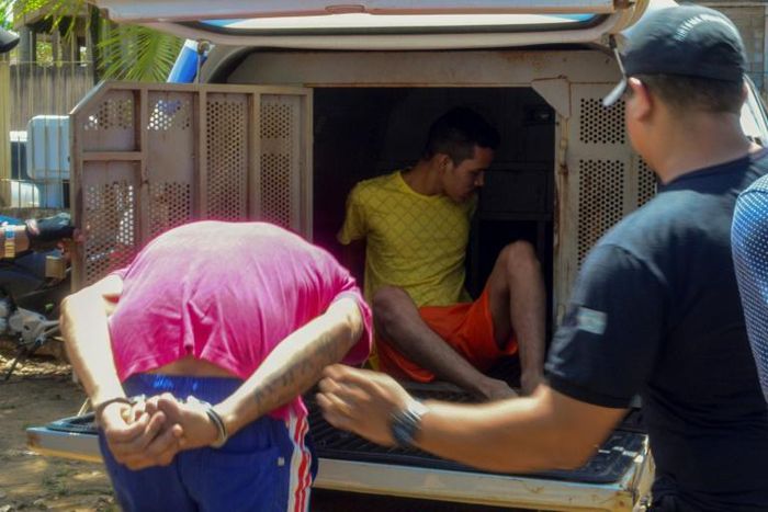 Inmates being transferred after a deadly riot at a prison in the Brazilian northern city of Altamira, Para State: 58 inmates died in the unrest and another four suffocated to death during the subsequent transfer