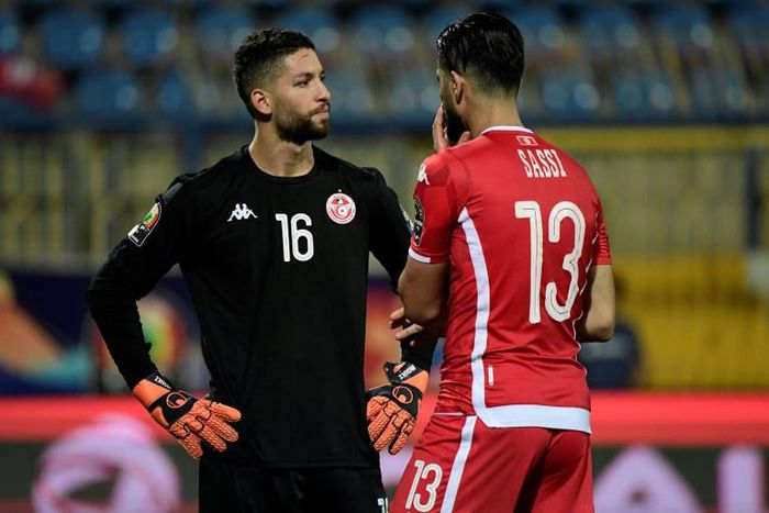 Tunisia goalkeeper Mouez Hassen (L) was furious at being replaced ahead of the penalty shootout