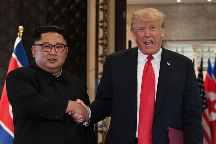 US President Donald Trump (R), seen here with Kim Jong Un in Singapore June 12, 2018, says he has received another 'beautiful letter' from the North Korean leader