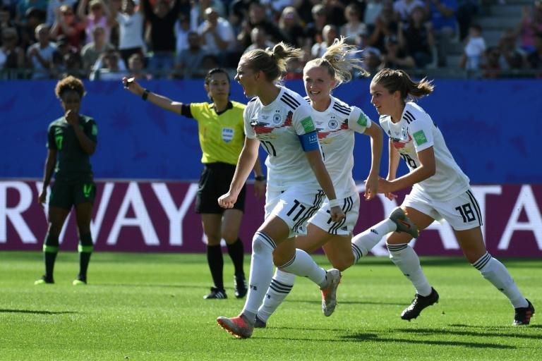 Alexandra Popp celebrates after putting Germany in front in their World Cup tie against Nigeria. They went on to win 3-0 in Grenoble