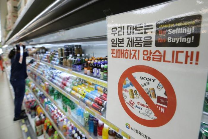 A shop sign in Seoul informs customers that it will not sell products from Japan, as a trade dispute between the US allies worsens