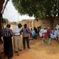 People gather to offer condolences in front of the family home of a slain Sudanese school pupil in the central city of Al-Obeid