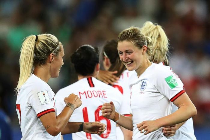 England players celebrate after Ellen White netted one of her two goals in the 2-0 win over Japan in Nice