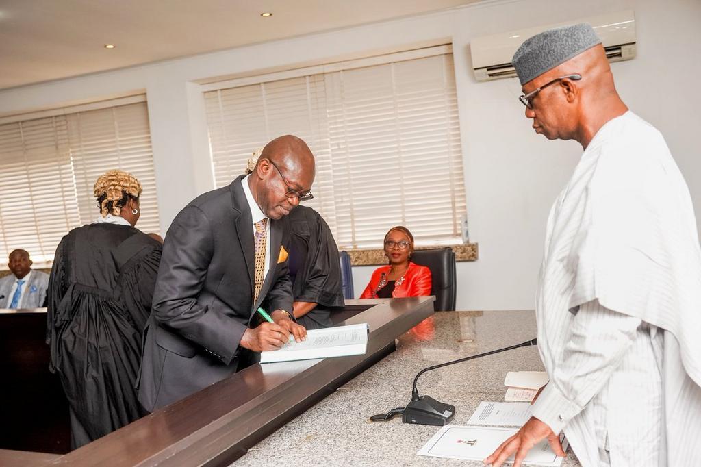 Governor Dapo Abiodun swears in Mr. Olatokunbo Talabi and Alhaji Salisu Shuaib as Secretary to the State Government and the Chief of Staff respectively. [Twitter/@@dabiodunMFR]