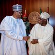 President Muhammadu Buhari shakes hands with former president, Olusegun Obasanjo