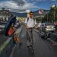 A man rides an electric scooter in the Colombian city of Medellin -- one of many cities in Latin America where the scooters are popular, and wreaking havoc on traffic