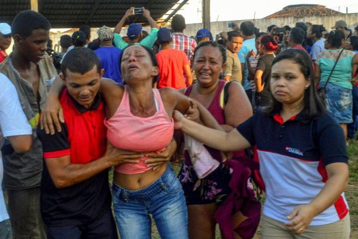 Relatives of inmates react after getting information about their loved ones a day after a riot at the Altamira Regional Recovery Center in the northern city of Altamira in Brazil