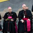 Carlo Maria Vigano (L), the former Vatican ambassador to the United States, with other prelates as they listen to a speech by Pope Francis in Philadelphia on September 25, 2015