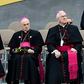 Carlo Maria Vigano (L), the former Vatican ambassador to the United States, with other prelates as they listen to a speech by Pope Francis in Philadelphia on September 25, 2015