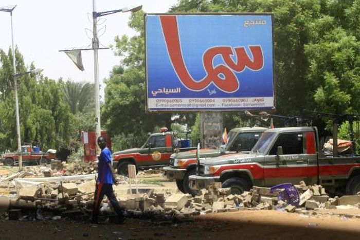Fewer people than usual were on the streets of Khartoum, patrolled by heavily armed paramilitaries